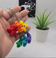 mini articulated starfish on keychains with plants and the crafticist logo in the background